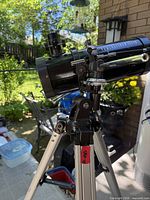 Side view of optical tube showing focuser, finder scope and branding
