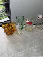 Group shot of all seven glasses and mugs