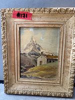 Front view of framed oil painting