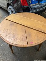 Table top with leaf inserted showing overall condition