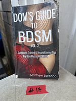 Front cover of the paperback book showing title, author, subtitle and wear