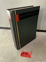 Front and spine view of hardcover book Secrets and Stories of the War Volume 1