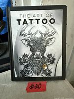 Front cover of The Art of Tattoo book showing title and artwork