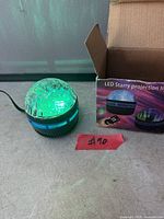 Lamp lit green in front of box