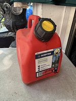 Front view of 5 L Scepter gas can with label and cap