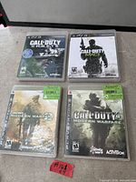 Front view of four PS3 Call of Duty titles in cases