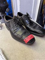 Top view of both shoes showing leather uppers and laces