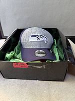 Cap inside original black box with tissue