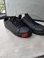 Front angled view of both shoes showing overall style and condition