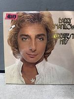 Front cover of Barry Manilow Greatest Hits LP