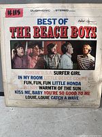 Front sleeve of Best of The Beach Boys LP showing artwork and song list