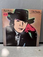 Front of album jacket with artwork and wear visible