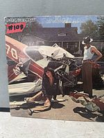 Front cover of Sparks Indiscreet LP showing artwork and condition