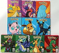 Front view of all ten Pokémon Happy Meal boxes stacked in two rows