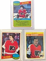 All three autographed Flyers trading cards in sleeves
