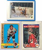 All three signed hockey cards in holders