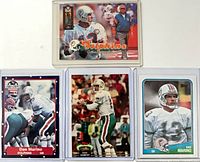All four Dan Marino cards in plastic holders