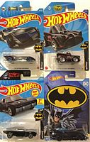 Group shot of three sealed Hot Wheels Batman Batmobiles on cards