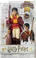 Front view of sealed Harry Potter Quidditch figure with broomstick in packaging