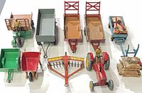 Overhead view of entire group of die-cast farm vehicles and implements