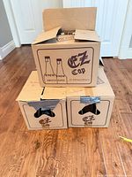 Three EZ Cap cartons stacked, showing 12-500 mL marking