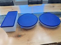 All three containers side by side on table