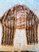 Full view of mink stole exterior showing fur pattern and lining