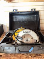 Circular saw in open case, overall view