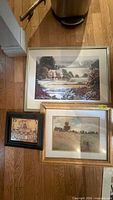 all three framed prints on floor showing relative sizes and frames