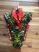 Closed playset top view showing dragon figure and cannons