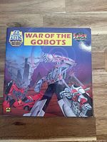 Front cover showing title, GoBots and Golden Super Adventure branding