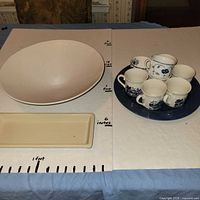 overview of all serveware items arranged on table