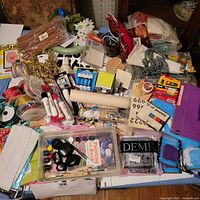 Overview of entire assortment of craft supplies on table