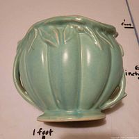 Front view of aqua McCoy lily bud vase