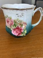 Side view showing floral decal and color gradient
