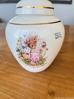 Front view of ginger jar showing decal, gilt trim and crazing