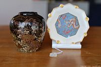 Front view of vase and dish side by side
