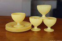 Full set showing stacked saucers and four sherbet cups