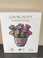 Front of sealed Color Cactus wooden puzzle box