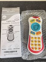 Box and toy remote front view