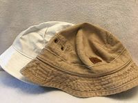 Both hats side by side showing colors and styles