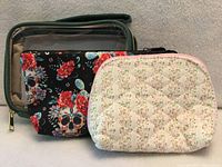 All three makeup bags grouped together