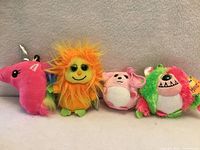 All four plush key-chain clips lined up