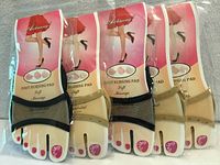 Front view of five sealed packages showing branding, product name and quantity
