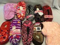 Group view of all ten pairs of assorted slippers