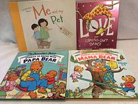 All four book fronts visible