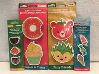 Front view showing all four sealed Snifin scented eraser packs
