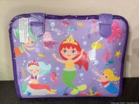 Front of sealed purple mermaid activity book