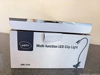 Front of box showing brand, model DML1034 and product image