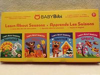 Front of boxed BabyBibi Learn About Seasons set showing four cloth books